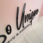 Close up to show the detail of Acrylic Salon Sign - Frosted acrylic background with black gloss 3d business logo