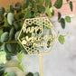 Wooden Cake Topper in a hexagon shape with honeycomb and bee details.