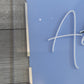 Custom Salon Sign made from 2 layers of acrylic to create a 3d logo